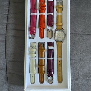 Woman’s Invicta Watch with seven interchangeable bands